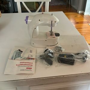 Never been used mini sewing machine
